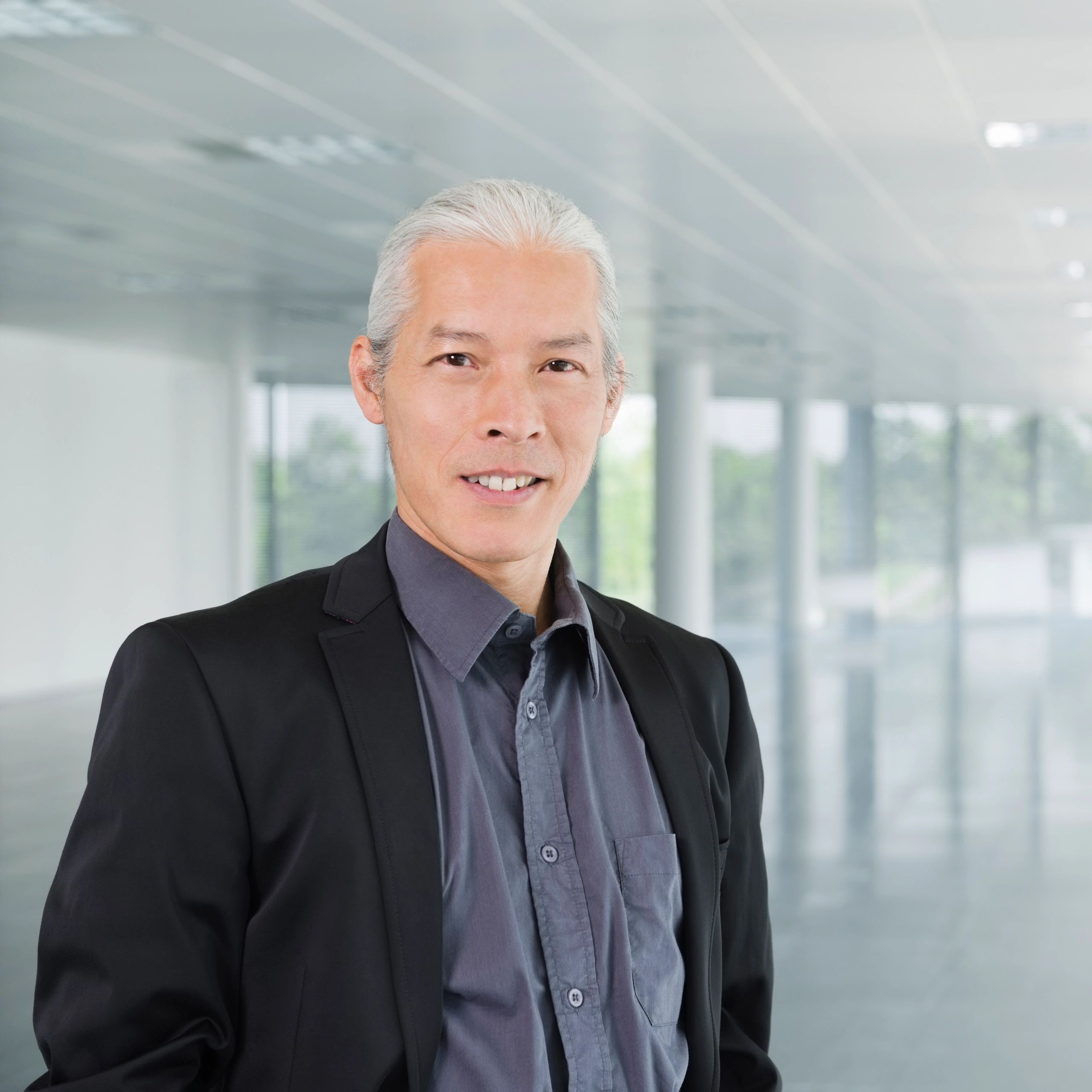Professional executive portrait representing client leadership